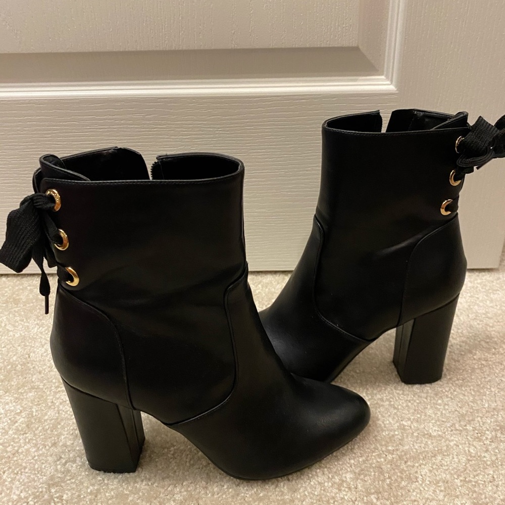 Tommy Hilfiger Booties never worn. Size 7 1/2